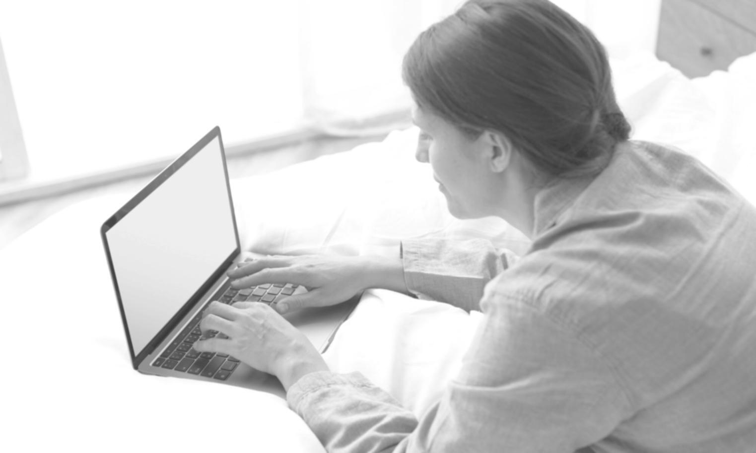 Financial analysis workspace showing complex spreadsheet modeling on computer screen